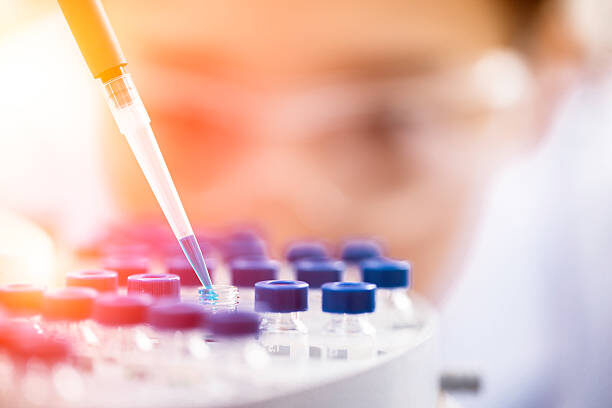 female chemist at work in laboratory.